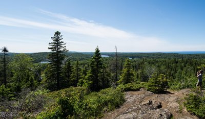 My cousin capturing the expanse of the view on the almost hidden Greenstone Lookout on the way back to Daisy Farm